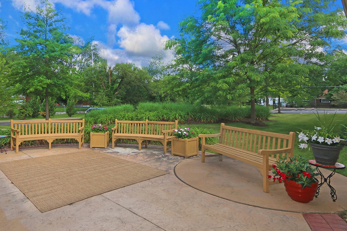 Outside patio with flower boxes and seating