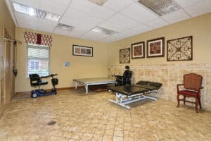 Treatment room in rehab gym with stretch tables
